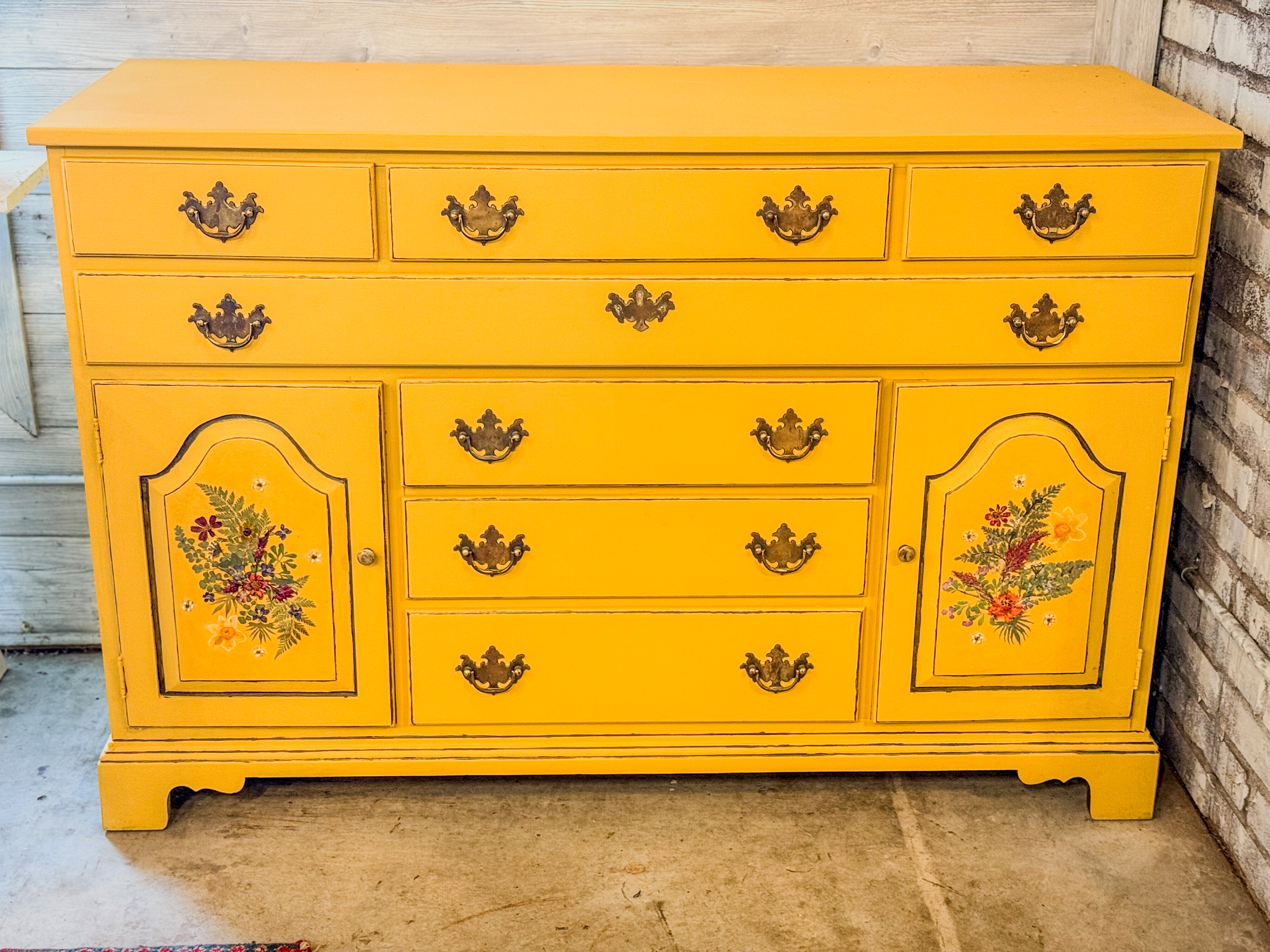 The Cabinet of Wonders — Luli's yellow painted dresser, decorated with pressed flowers