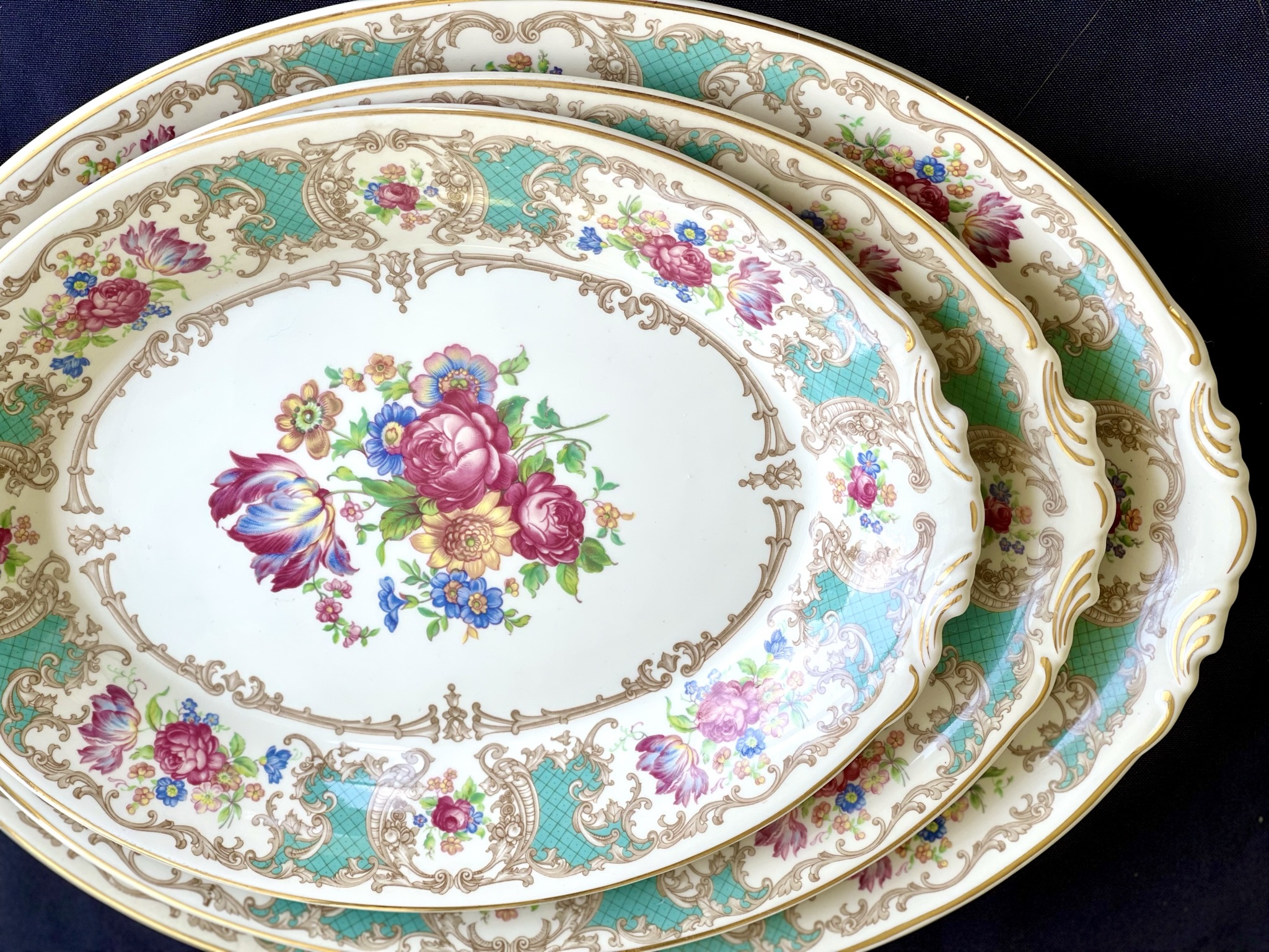 Romance in aqua — the same pattern in an exuberant aqua colorway, almost fantastical, with vivid floral border