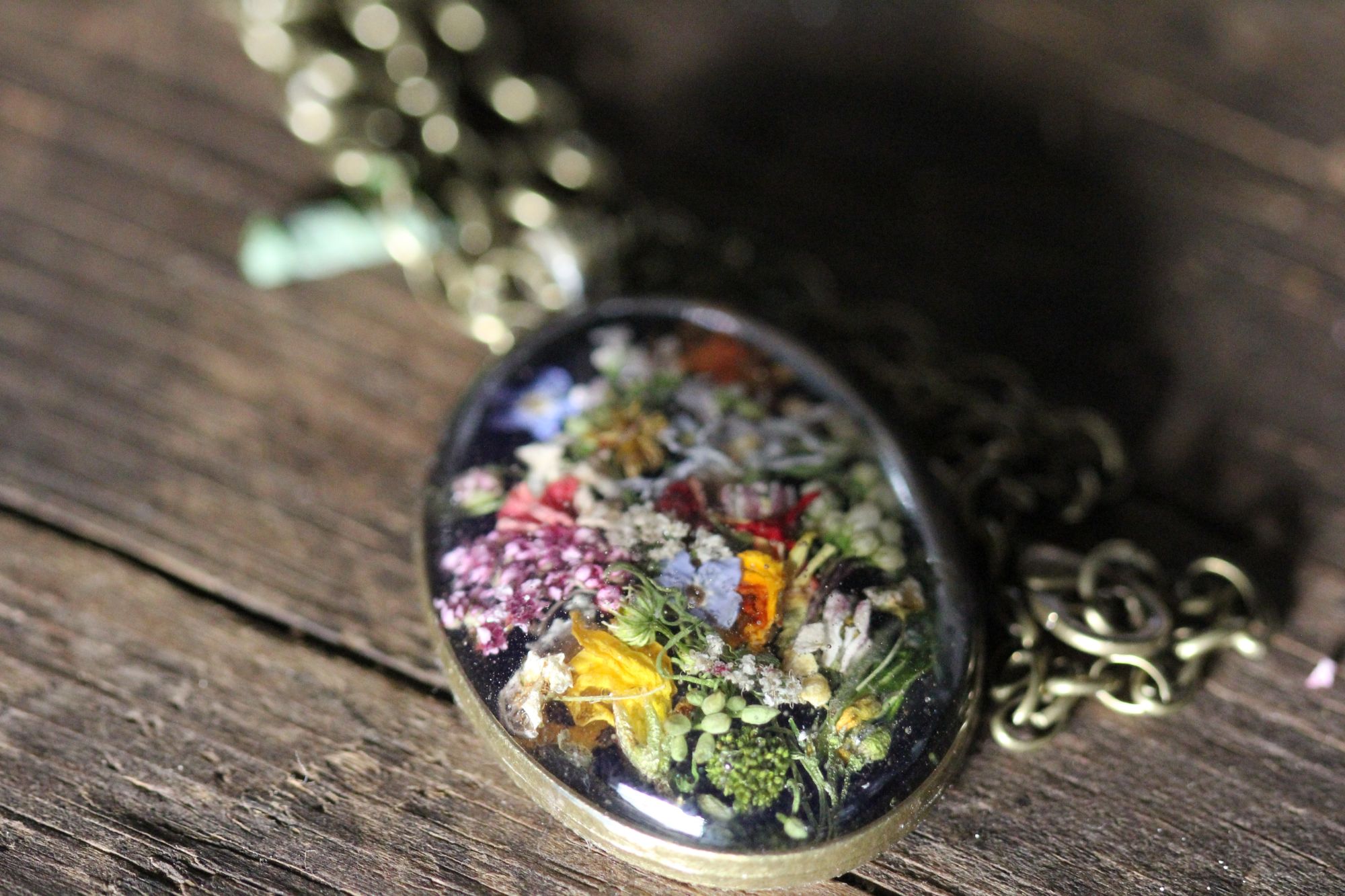 A Floral Alchemy pendant — the Codex made visible