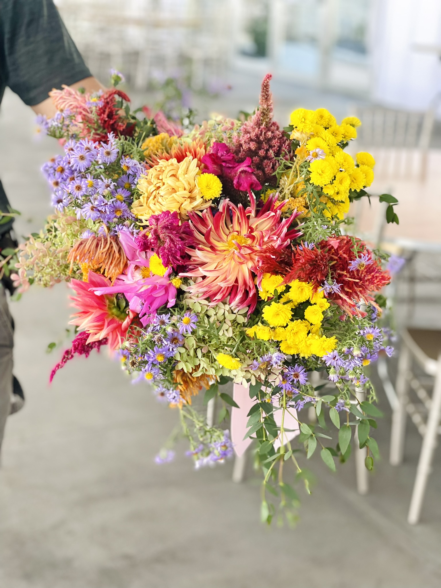 Close shot of the massive colorful bouquet — dahlias, mums, asters and celosia, built in under ten minutes